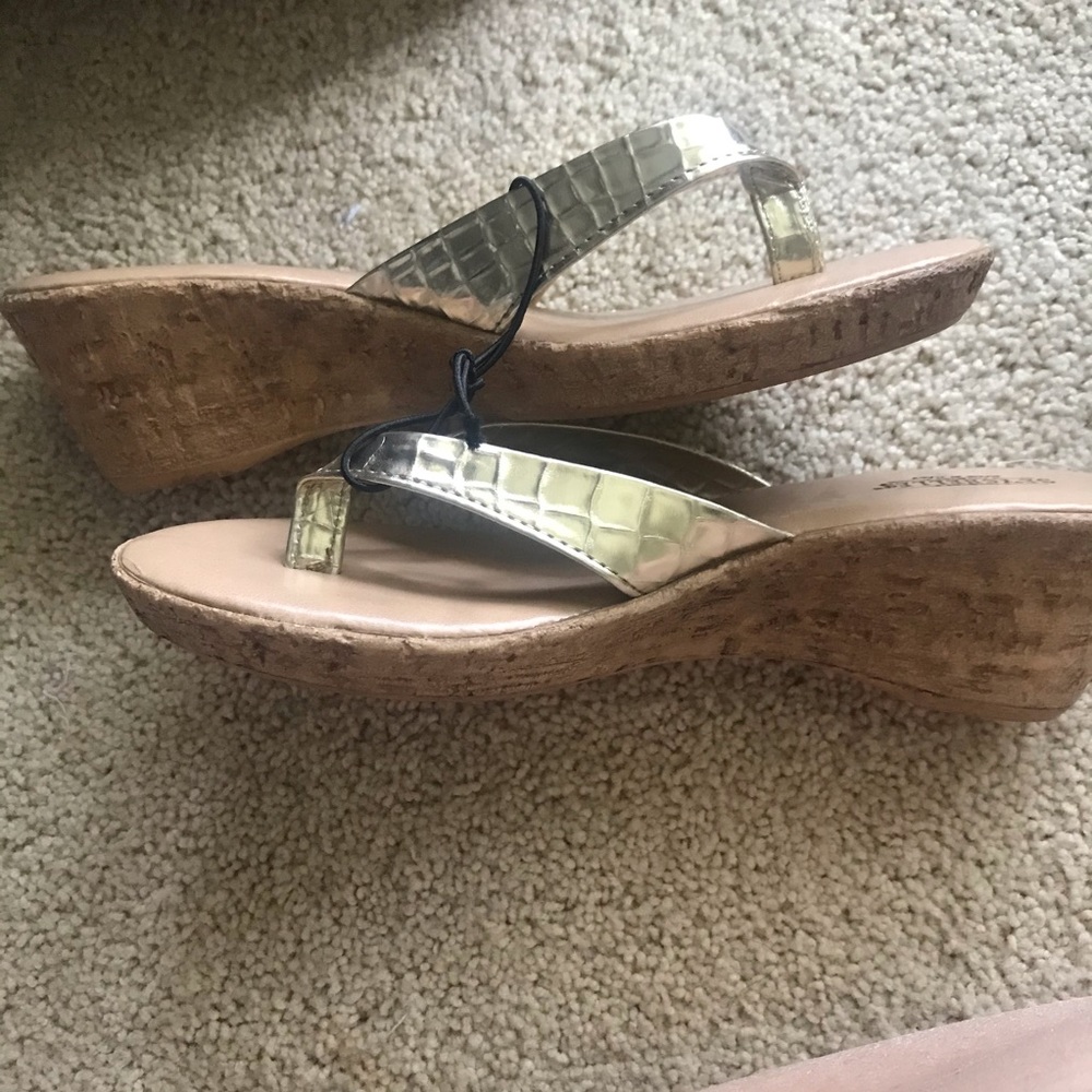 Wedged gold flip flops size 6